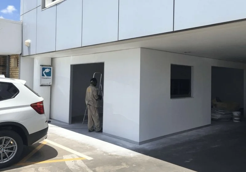 Moisture resistant drywall Being installed in a factory